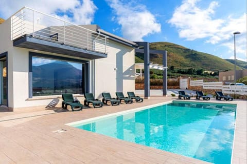 Property building, Day, Natural landscape, Pool view, Swimming pool, Swimming pool, sunbed