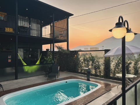 Patio, Day, Natural landscape, Mountain view, Swimming pool, Sunrise, sunbed