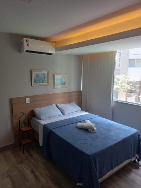 Bed, air conditioner