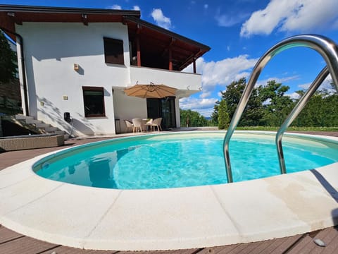 Property building, Patio, Day, Natural landscape, Balcony/Terrace, Pool view, Swimming pool, sunbed