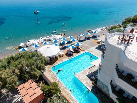 Property building, Restaurant/places to eat, Beach, Swimming pool