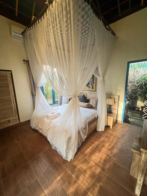 Bed, air conditioner