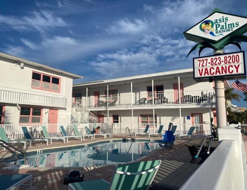 Property building, Day, Pool view, Swimming pool, sunbed