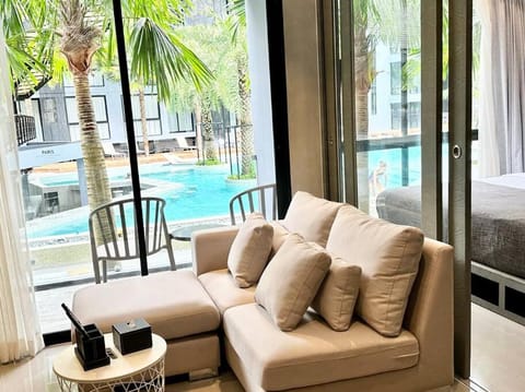 Day, View (from property/room), Balcony/Terrace, Living room, Seating area, Pool view, Swimming pool