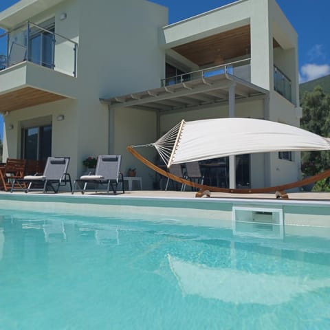 Property building, Patio, View (from property/room), Balcony/Terrace, Pool view, Swimming pool, sunbed