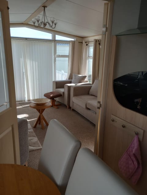 Luxury 2 bedroom caravan with large decking close to beach Free WiFi Campground/
RV Resort in Towyn