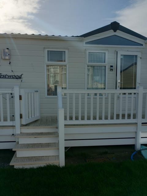 Luxury 2 bedroom caravan with large decking close to beach Free WiFi Campground/
RV Resort in Towyn
