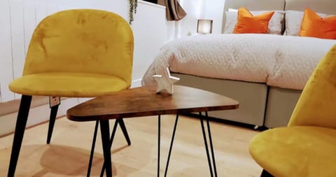 Bed, Living room, Seating area