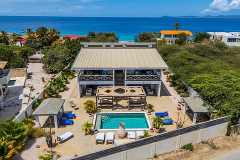 Property building, Patio, Day, Natural landscape, Pool view, Sea view, Swimming pool, sunbed