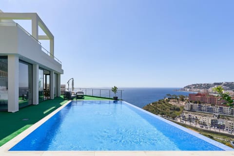 Property building, Living room, Swimming pool