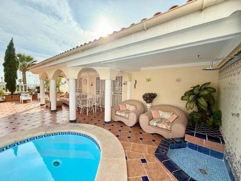 Property building, Living room, Swimming pool