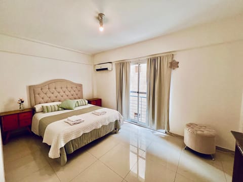 Bed, Photo of the whole room, Bedroom, towels, air conditioner