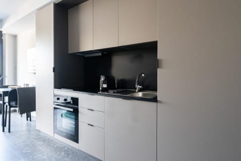 Kitchen or kitchenette, stove