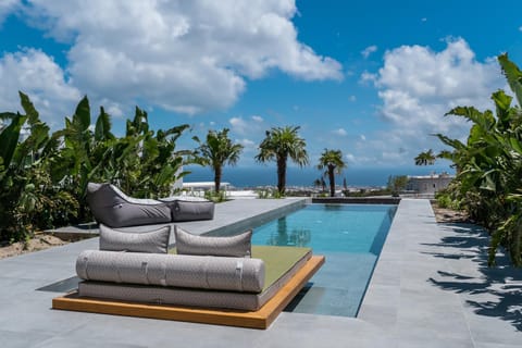 Patio, Day, Natural landscape, Garden, Living room, Seating area, Garden view, Pool view, Sea view, Swimming pool, sunbed