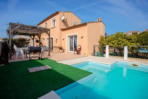 Property building, Living room, Swimming pool