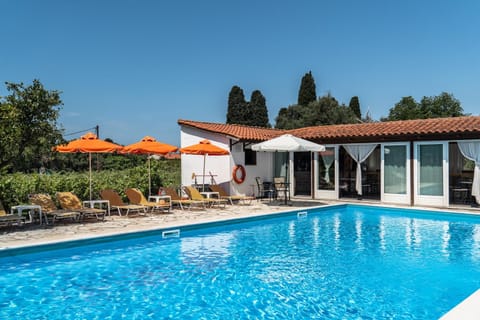 Property building, Living room, Swimming pool