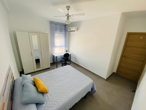 Photo of the whole room, air conditioner