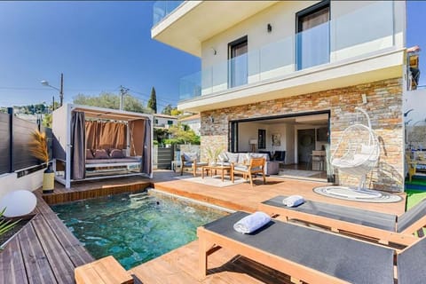 Property building, Patio, Communal lounge/ TV room, Garden, View (from property/room), Living room, Pool view, Swimming pool, sunbed