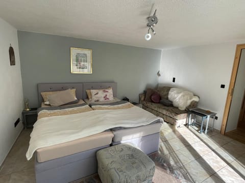 Bed, Seating area, Bedroom