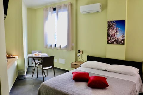 Bed, Bedroom, hair dresser, towels, air conditioner