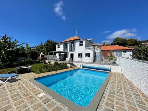 Property building, Pool view, Swimming pool, sunbed