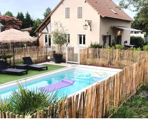 Property building, Pool view, Swimming pool, sunbed