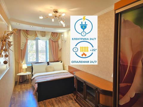 Bed, Property logo or sign, Photo of the whole room, Logo/Certificate/Sign, Bedroom, Text overlay, Certificate/Award