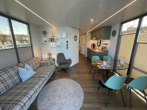 Hausboot Fjord Baltica mit Dachterrasse in Barth Docked boat in Mecklenburg-Vorpommern, Germany