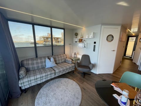 Hausboot Fjord Baltica mit Dachterrasse in Barth Docked boat in Mecklenburg-Vorpommern, Germany