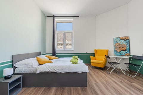 Bed, Seating area, Bedroom