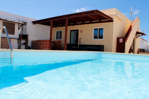 Property building, Living room, Swimming pool