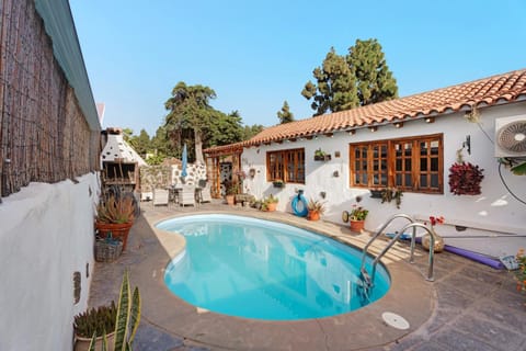 Property building, Living room, Swimming pool