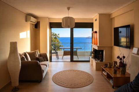 Natural landscape, TV and multimedia, View (from property/room), Living room, Seating area, Sea view