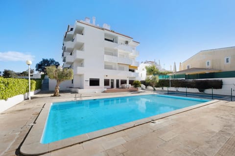 Property building, Living room, Swimming pool