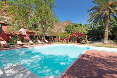 Property building, Living room, Swimming pool