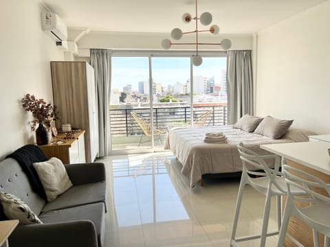 Bed, Balcony/Terrace, Photo of the whole room, Seating area, Bedroom, air conditioner