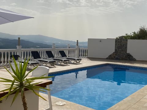 Property building, Living room, Swimming pool