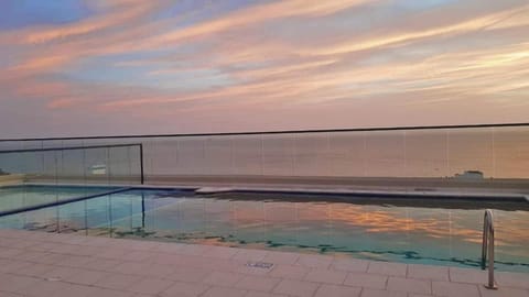 View (from property/room), Swimming pool, Sunset