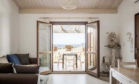 Natural landscape, Living room, Seating area, Dining area, Sea view