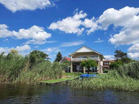Property building, Natural landscape, Lake view