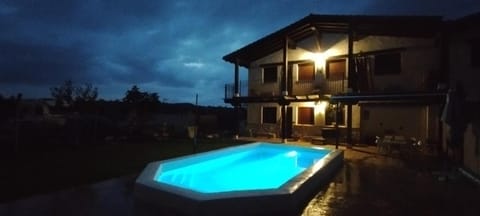 Property building, Night, Pool view, Swimming pool
