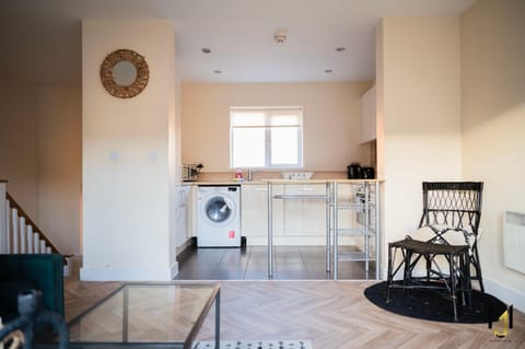 Kitchen or kitchenette, Living room, Seating area, washing machine