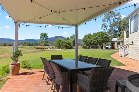 Patio, Natural landscape, Garden, Seating area, Dining area, Mountain view