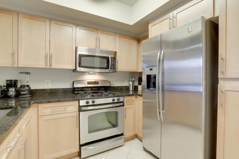 Kitchen or kitchenette, dishwasher, oven, stove, toaster