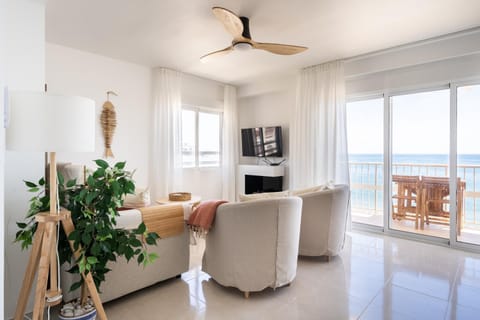 TV and multimedia, Living room, Seating area, Sea view, fireplace