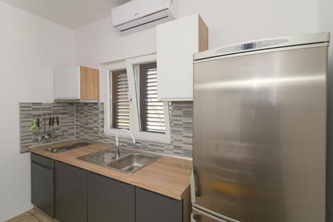 Kitchen or kitchenette, stove