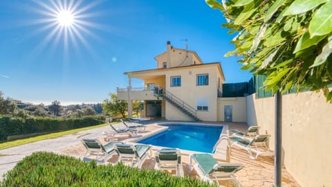 Property building, Living room, Swimming pool