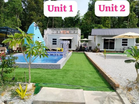 Property building, Day, Garden, Text overlay, Garden view, Pool view, Swimming pool, sunbed