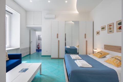 Bed, Living room, Photo of the whole room, Seating area, Bedroom, wardrobe, air conditioner