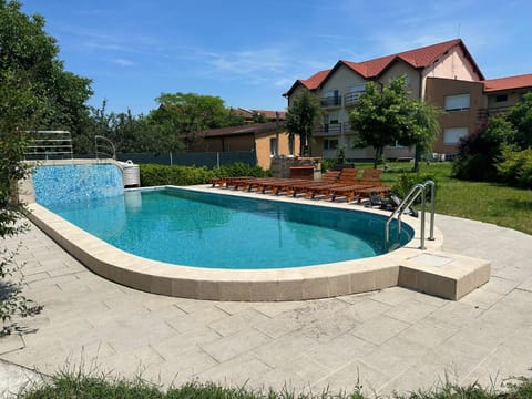 Property building, Day, Garden, Pool view, sunbed